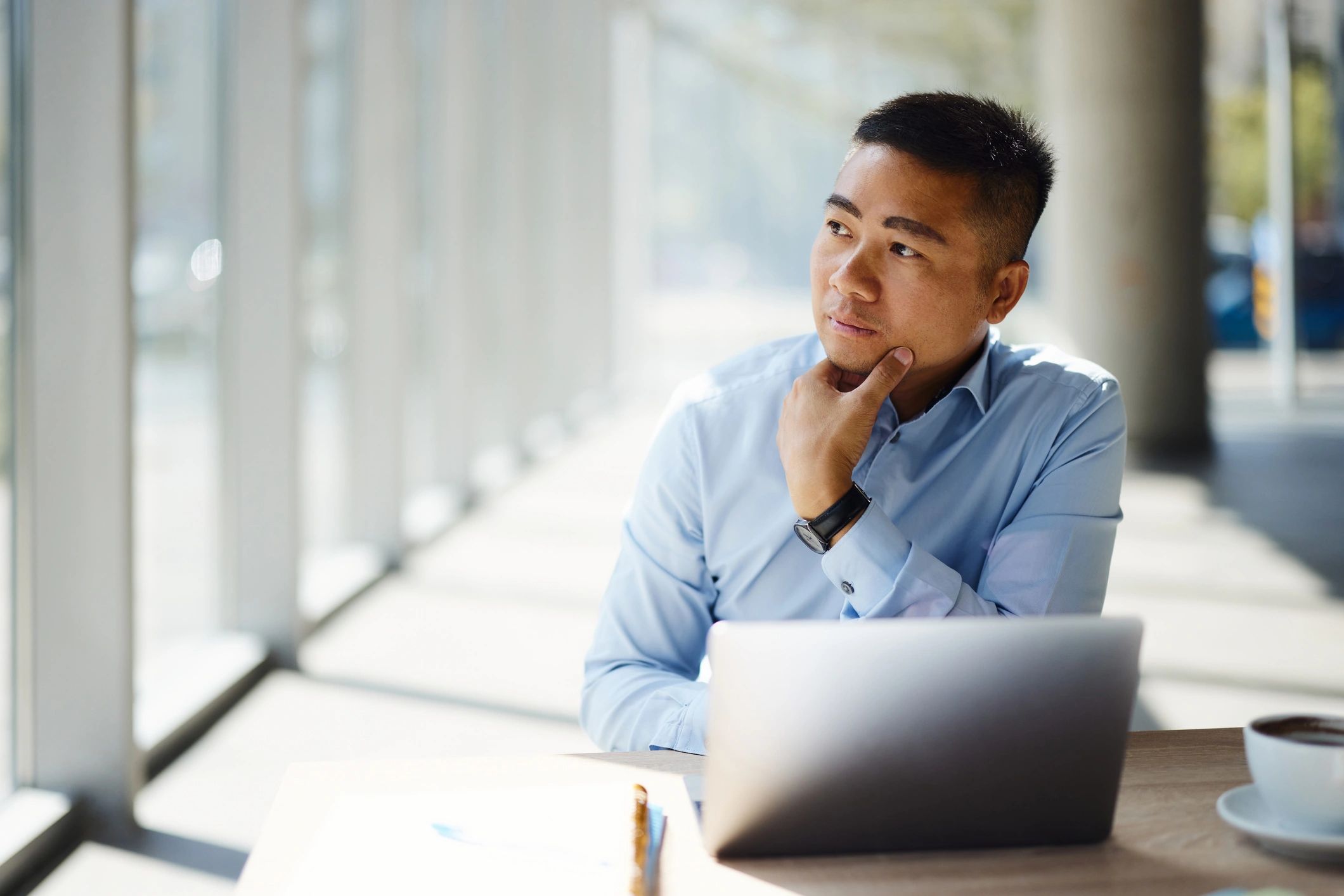 Technical specialist working on a laptop