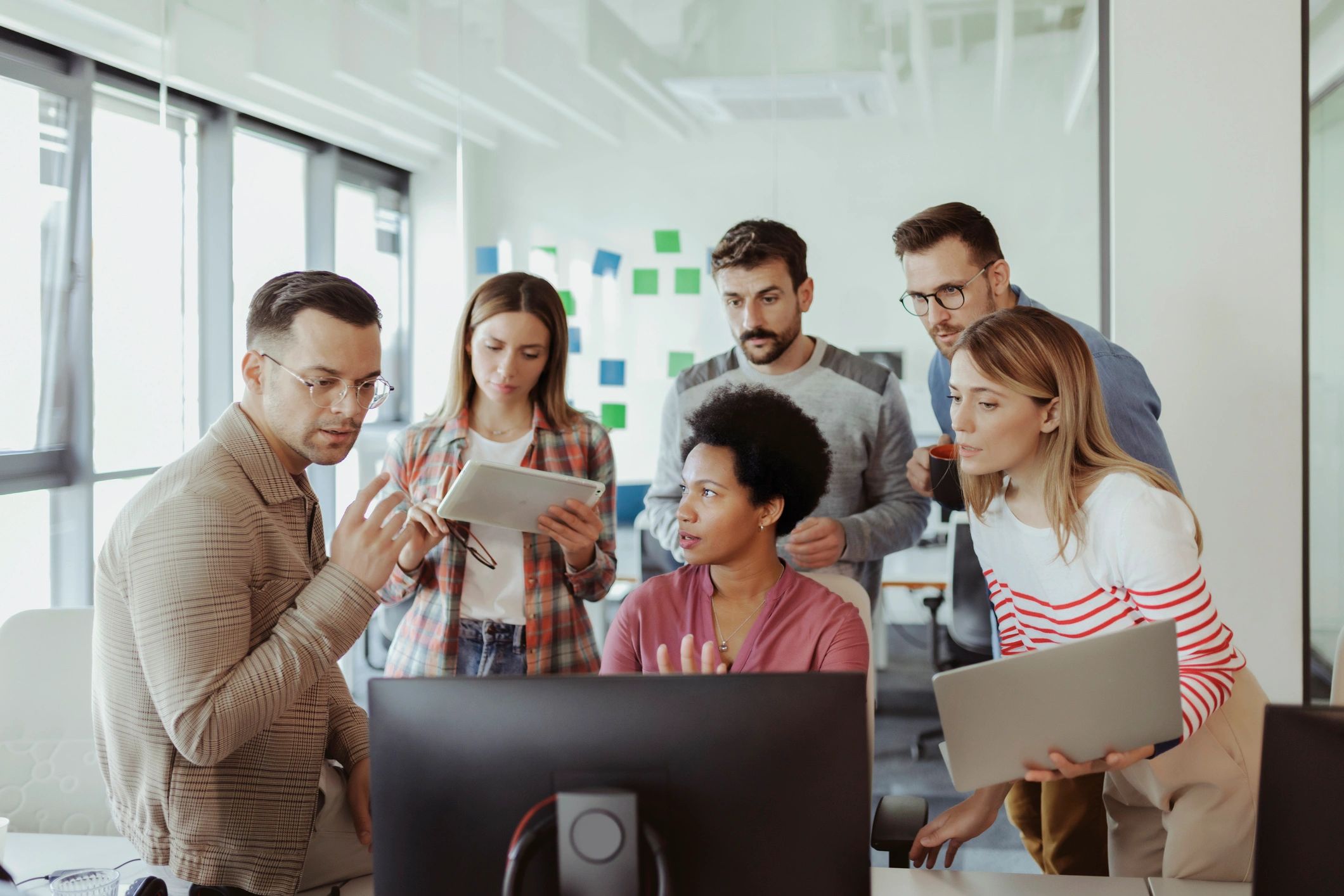 Technical professionals collaborating on a project