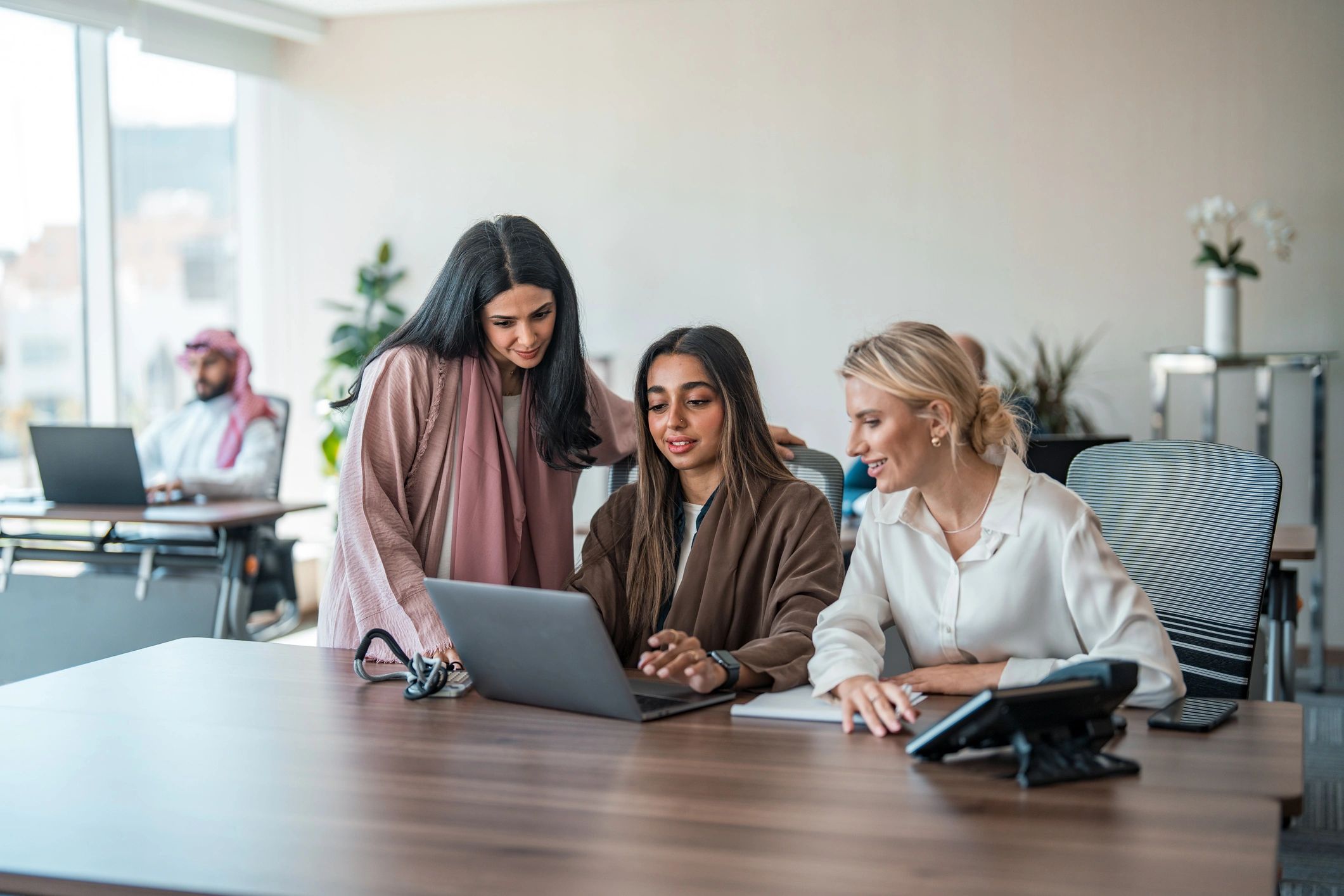 Technical professionals collaborating at a conference table